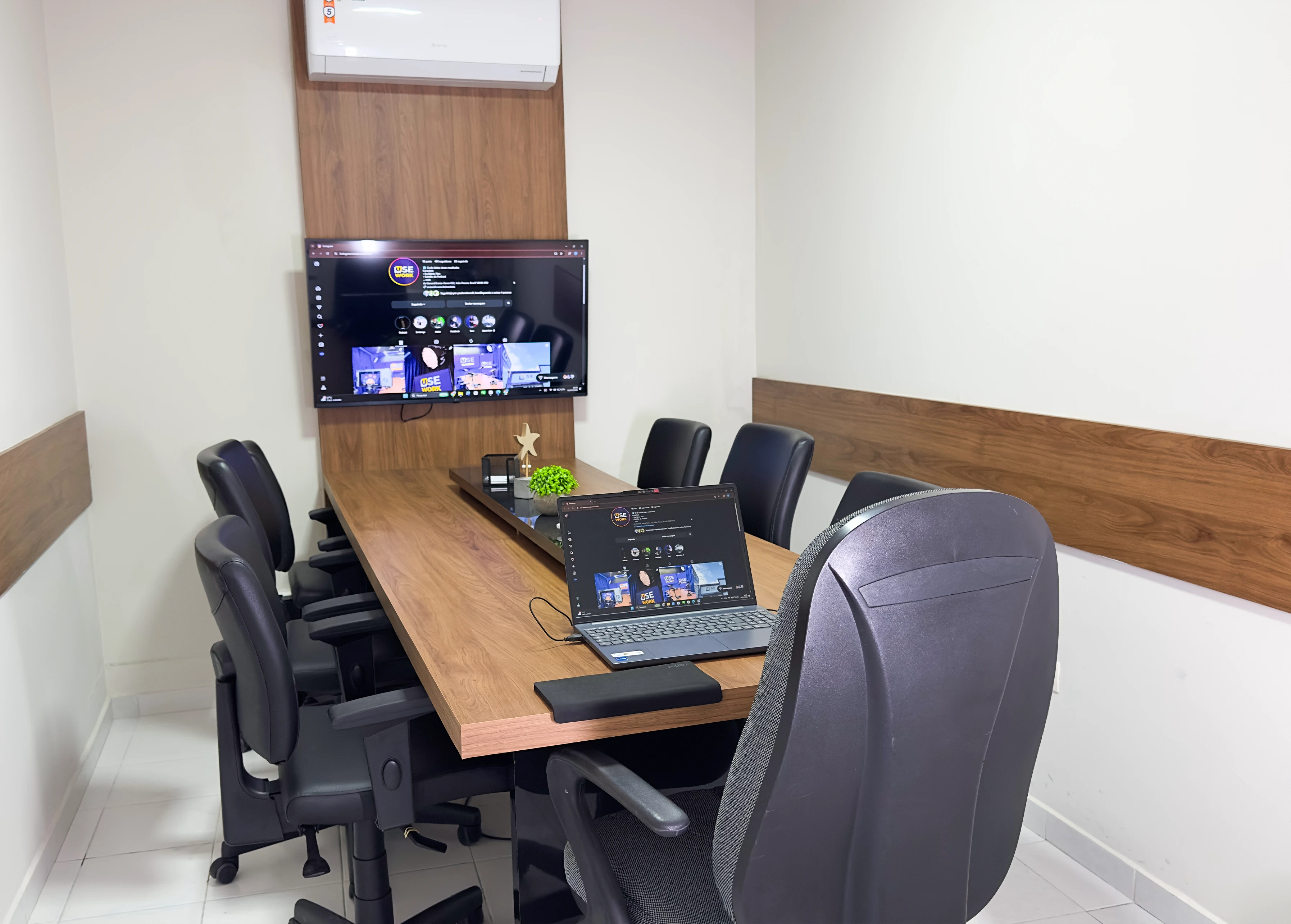 Large executive office suite with lounge area